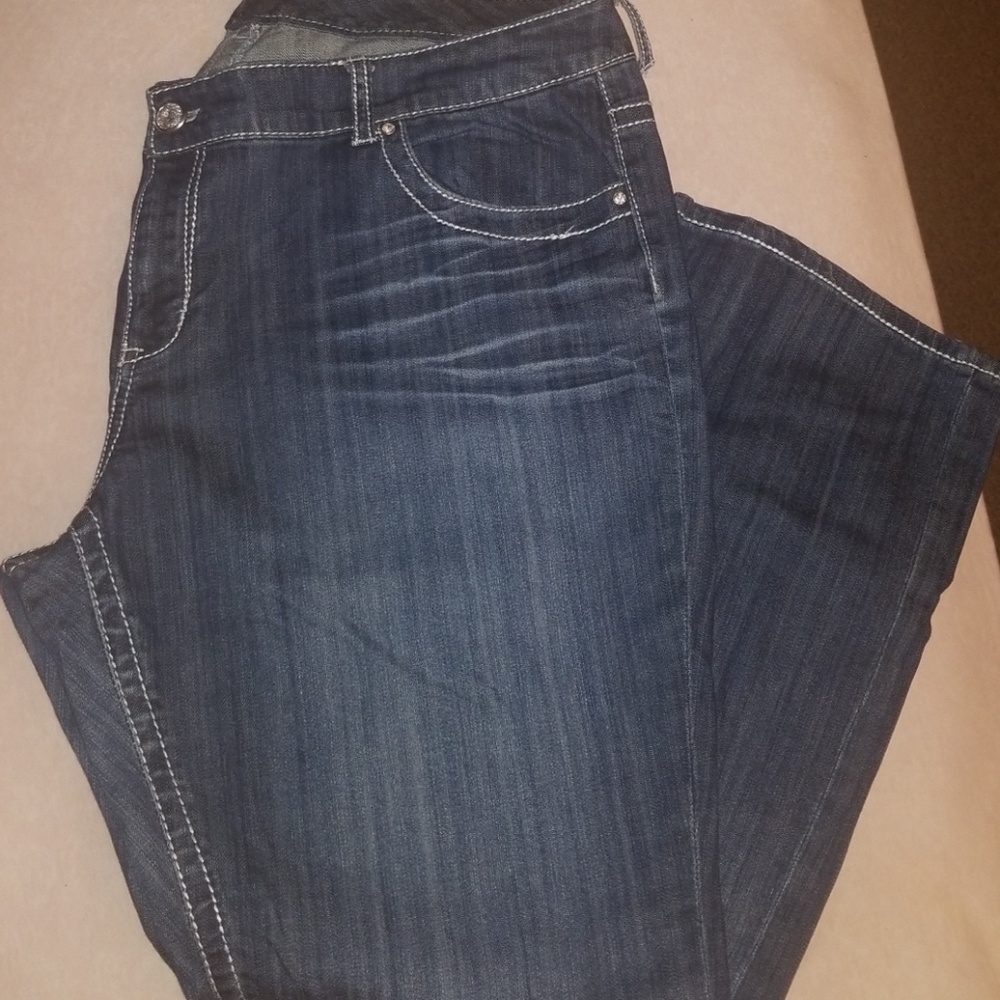 Blue denim seven Jean's with diamond studs!